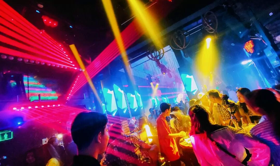 With covid restrictions lifted and a slow return to normalcy, Saigonese are partying at a beer club on Bùi Viện Walking Street with loud music, streams of overpriced beer, and flirty, scantily clad girls. And me in the middle of it. Ehm.