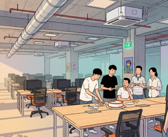 Illustration of an open-plan developer office with an exposed concrete ceiling, silver ducts and rows of wooden desks, where six young Vietnamese interns gather around a cake while a taller European man stands a step apart, watching them in the late afternoon light